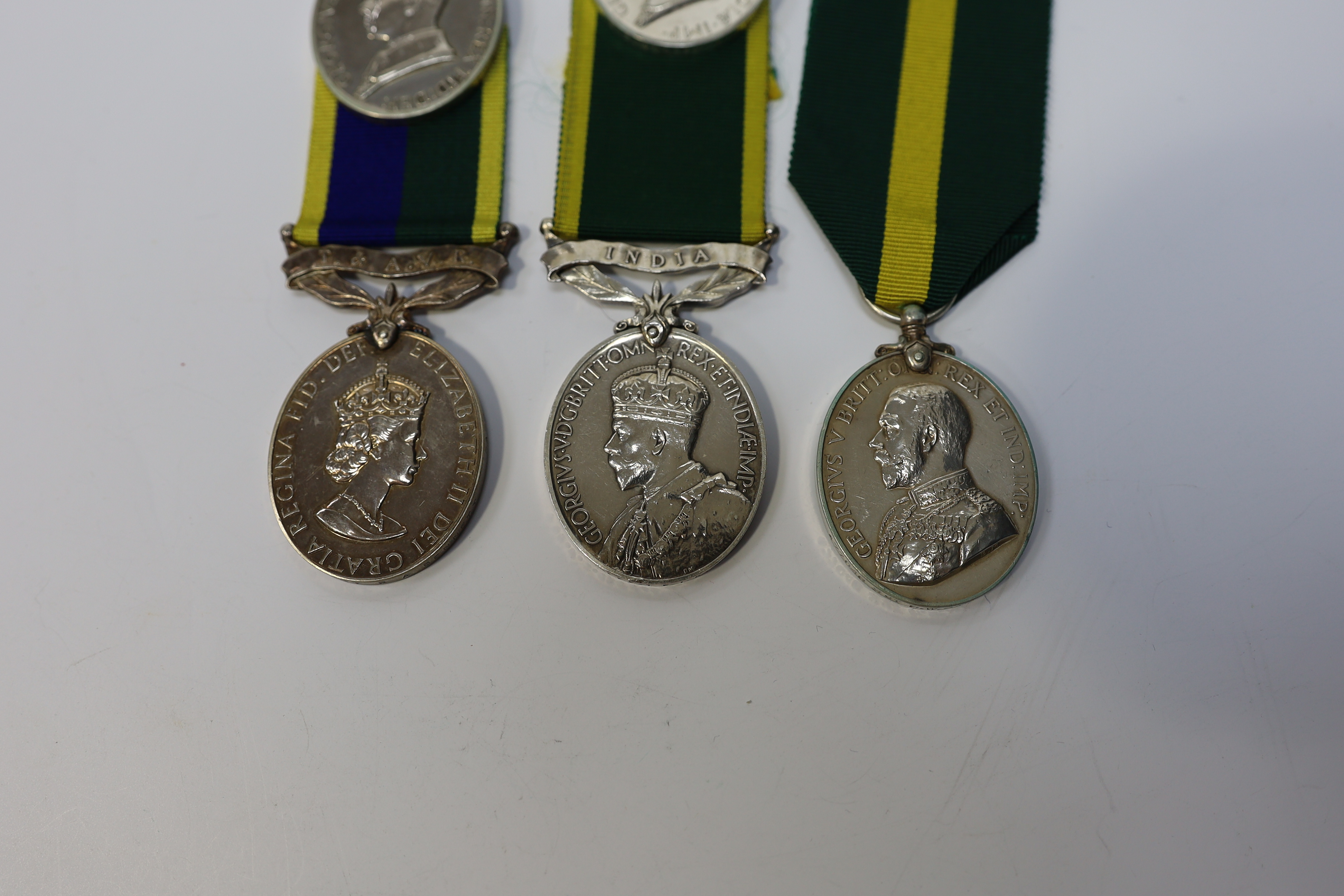 Six assorted Efficiency medals; GV (C) India to Pte.F.S.Slee,1 E.I.RY.R.,A.F.I.;GV (A) Territorial to 477046 Sjt H.W.Pawley, R.A.M.C.; GVI Militia to 2313197 Sclmn.S.H.Dummer, R.Signals.; GVI Territorial to 1434970 Gnr C